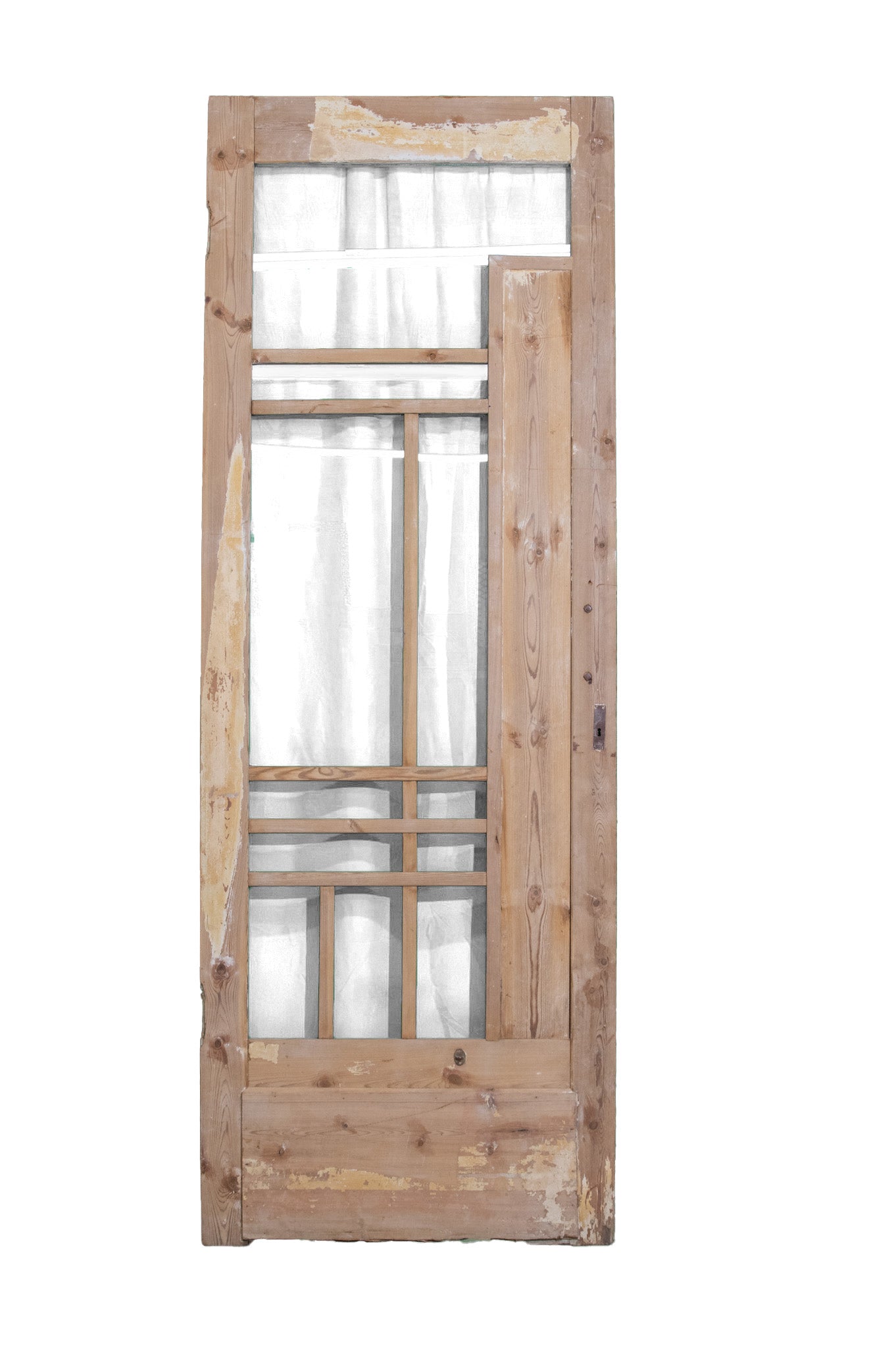 Old wooden door with multiple glass panes, featuring a solid wood bottom and a traditional design.